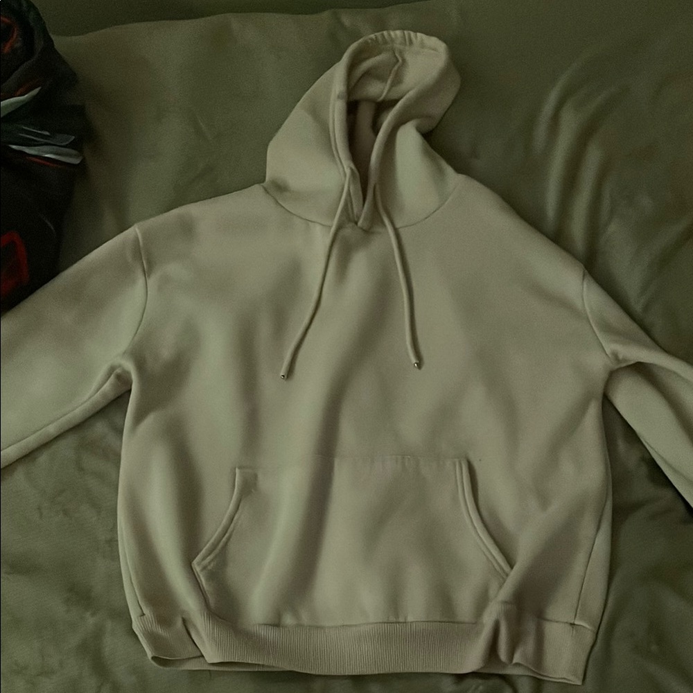 Elegant Cream Sweater with Luxurious Knit Texture